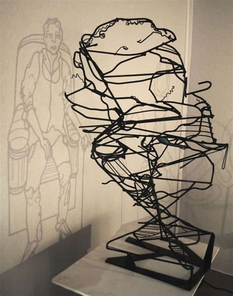 This Art Piece Hides Two Different Wire Sculptures Depending On Your