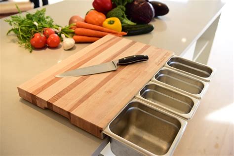 The family name can be replaced with your own. Cutting board with containers - ChopSlide Kitchen Board ...