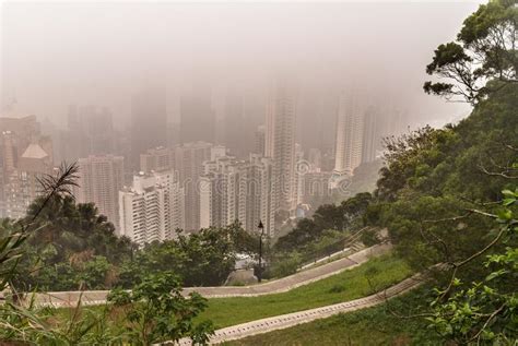 Highrise Buildings In The Fog On Hong Kong Island China Stock Photo