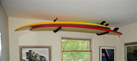In a surfboard ceiling rack. Offshore Winds: Surfboard Storage in a Studio Apartment ...