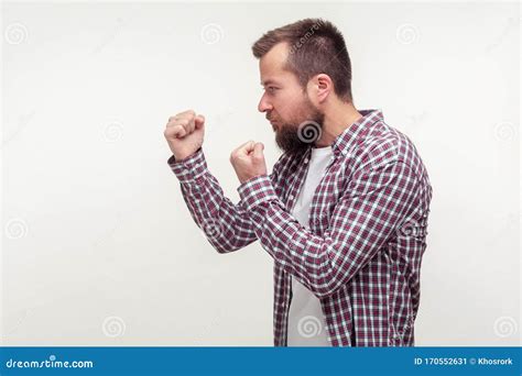 Let`s Fight Side View Of Aggressive Bearded Man Standing With Raised