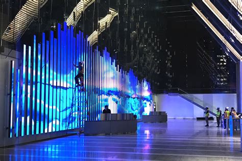 Office wall art is usually underestimated and overlooked at times. New riverfront office tower tests its giant LED ...
