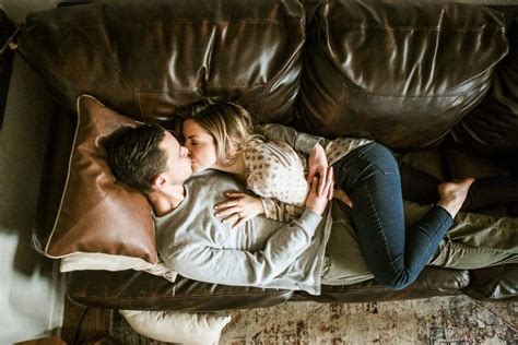 Couple Laying On Couch Kissing Romantic In Home Anniversary Session Couples Couple In Love