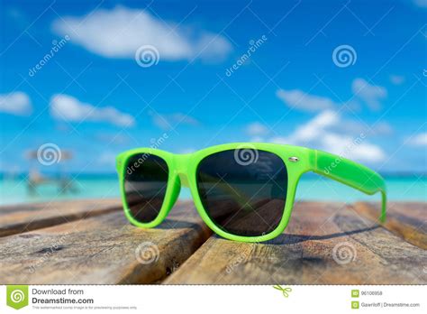 Picture Of Sunglasses On The Tropical Beach Vacation Traveler Stock