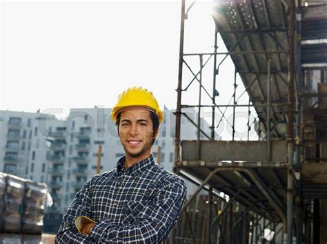 Construction Worker With Arms Folded Looking At Camera Copy Space