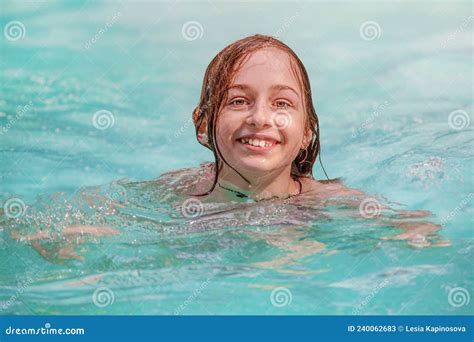 Happy Teen Girl Swims In The Pool Laugh Smile Child On Summer Vacation