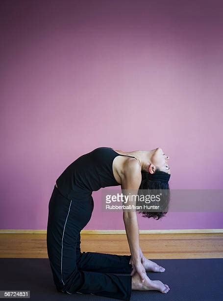 Side Profile Of A Woman Bending Over Backwards Photos And Premium High