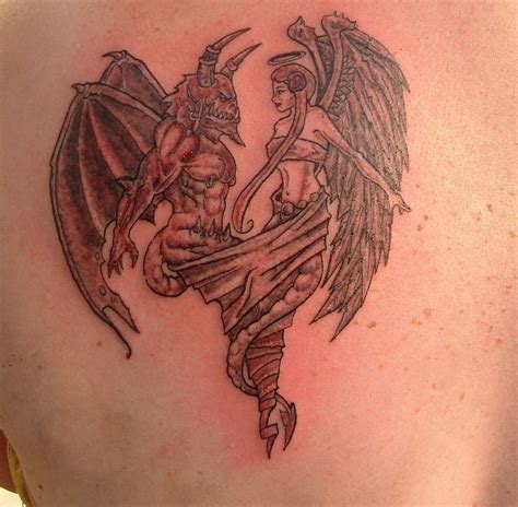 10968 more angel and demon fighting tattoo designs tattoo design. angel vs demon tattoo designs | angel and demon finish by ...