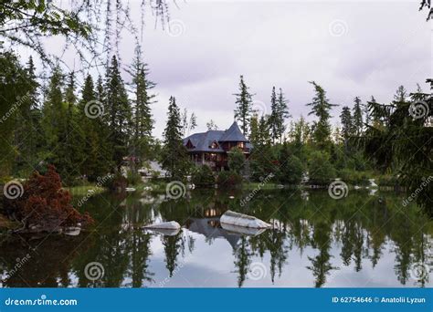 Quiet Mountain Lake Surrounded By Forest Stock Photo Image Of