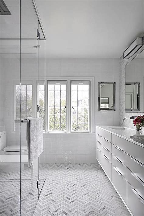 Also, if you opt for bold colors in your bathroom, using large neutral tiles with narrow grout lines will enhance the floor space without detracting from the unique color scheme(s) involved. 37 light gray bathroom floor tile ideas and pictures