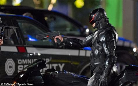 Robocop Pulls A Gun Rides His Robo Cycle In New Set Pics Clip Syfywire