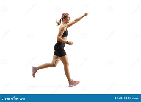 Fit Young Woman Running With Raised Arm Stock Photo Image Of
