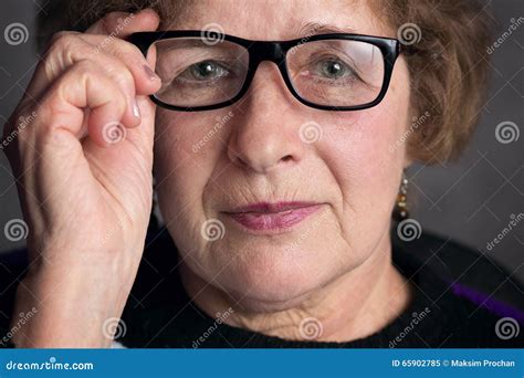 Portrait Of A Beautiful Older Woman With Glasses Stock Image Image Of Background Close 65902785