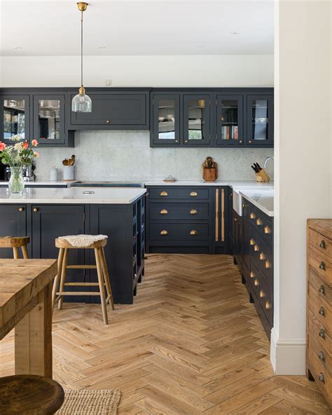 Classic Herringbone And Shaker Cabinetry Oak Floor Kitchen Open Plan