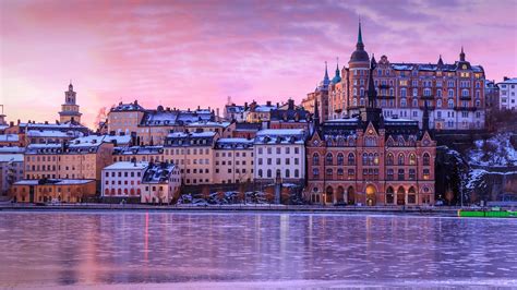 Sunrise Reflected In The Frozen Water Of Lake Malaren Stockholm