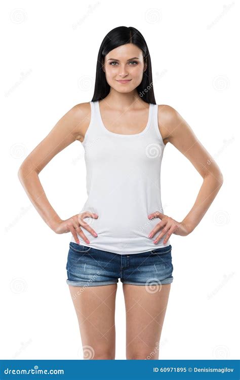 Woman Is In A White Tank Top And Blue Denim Shorts Isolated Stock