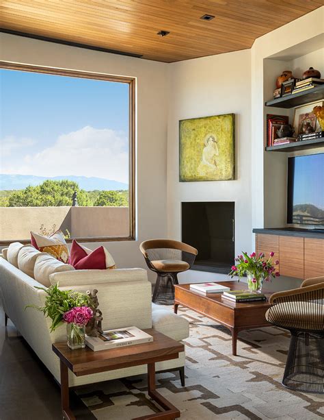 The natural browns hide dirt or stains while the red and turquoise add just enough color to make the room really pop! Santa Fe Modern Home by Prewitt Design | HomeAdore