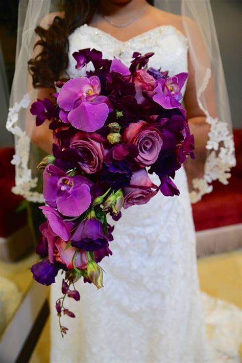 purple cascade bridal bouquet at the chapel at planet hollywood las vegas weddings bridal