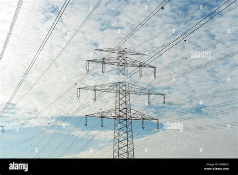 Power Masts Of High Voltage Cables Stock Photo Alamy