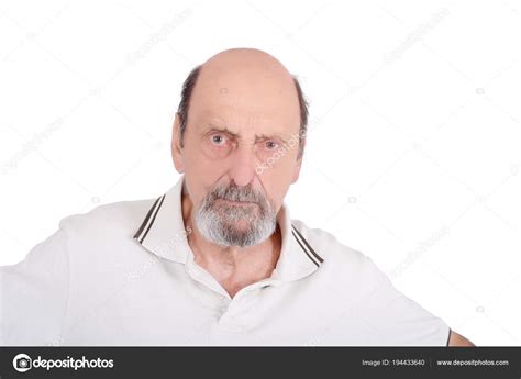 Portrait Of Senior Angry Man Frowning Stock Photo By ©nicomenijes 194433640