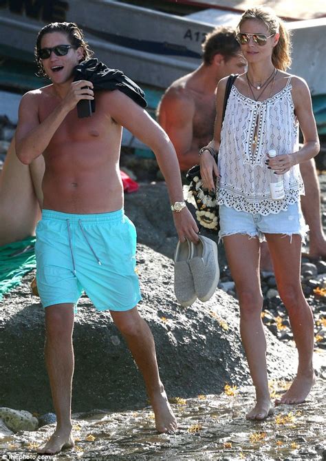 Heidi Klum Shows Off Her Long Legs In Hotpants As She Hits The Beach With Toyboy Vito