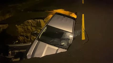 California Sinkhole Swallows Cars Firefighters Rescue Trapped Mother