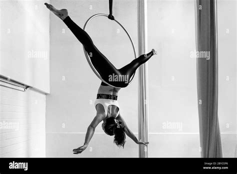 A Colombian Aerial Dancer Shows Off Her Acrobatics Skills On Aerial Hoop During A Training