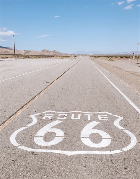 Route 66 Sign On Empty Desert Amboy In California Usa Stock Photo