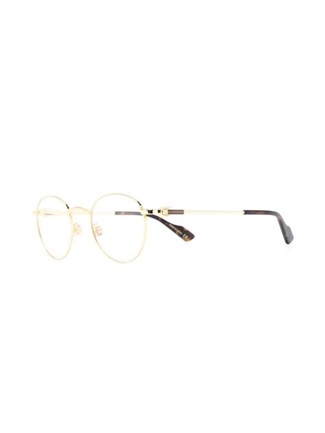 gucci eyewear round frame clear glasses farfetch