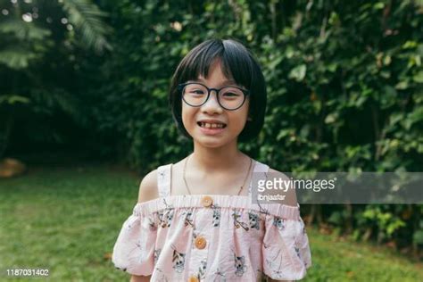 chinese girl glasses photos and premium high res pictures getty images