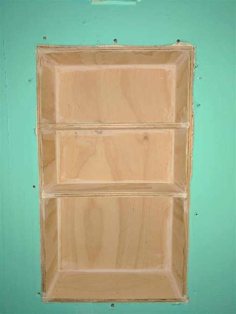 How to install medicine mirror cabinet. I made a recessed medicine cabinet hidden behind a sliding ...