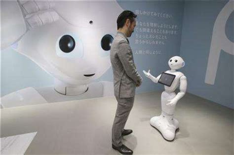 Chatty Japan Robot Makes Friends On First Day At Work