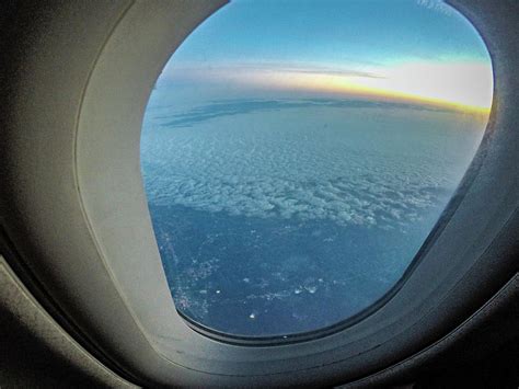 Looking Out Of Airplane Window During Flight Photograph By Alex