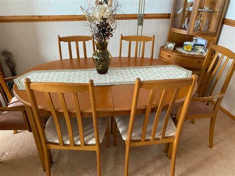 Having a dining room table and chairs that seats everyone comfortably and complements your design is an essential element of any home. Extending dining table and 6 chairs from Morris of Glasgow ...