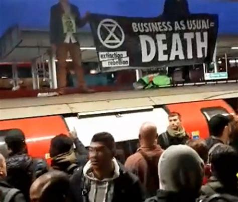 Extinction Rebellion Angry Commuters Drag Protesters Off London Tube Metro News