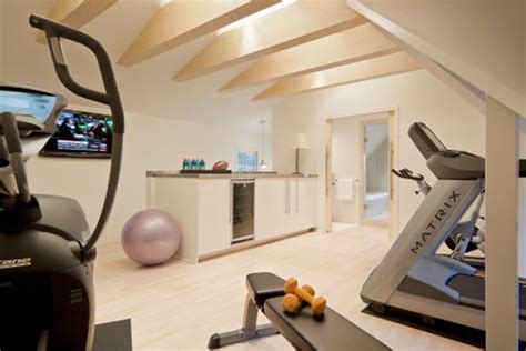Office / gym decor style. Home Gym Interior Design Ideas | InteriorHolic.com