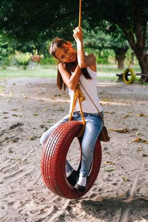 Pretty Girl Tire Swing Stock Photos Free And Royalty Free Stock Photos