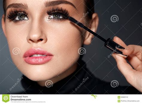 Beauty Beautiful Woman Applying Black Mascara On Eyelashes Stock Photo
