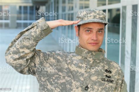 Brave American Soldier Saluting Portrait Stock Photo Download Image