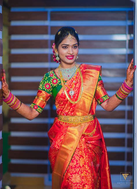 Pretty Kanchivaram Red Saree With Contrast Green Blouse Of Full Zordosi Work Wedding Saree
