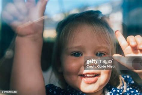 faces pressed against window photos and premium high res pictures getty images