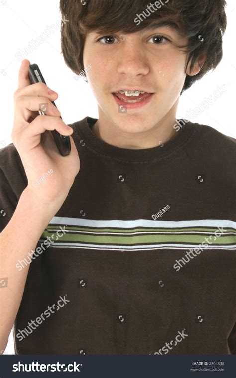 Maybe you would like to learn more about one of these? Cute 12 Year Old Boy With Cellphone. Wearing Braces. Brown ...