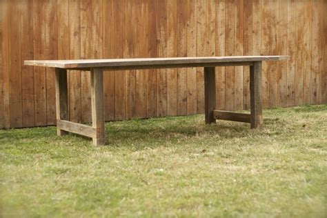 This table is topped with a polyresin and concrete blend that has a gray hue and a textured look. Arbor Exchange | Reclaimed Wood Furniture: Weathered ...
