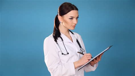 Portrait Of Female Doctor With Clipboard Stock Footage Video 1292302