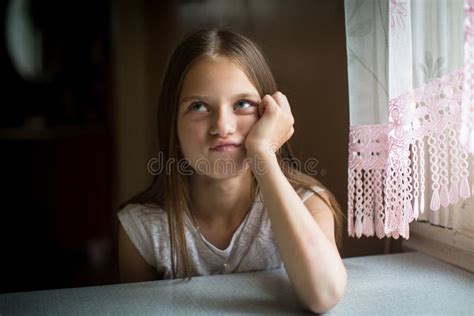 Cute Ten Year Old Girl Posing Camera Sitting Table Stock Photos Free