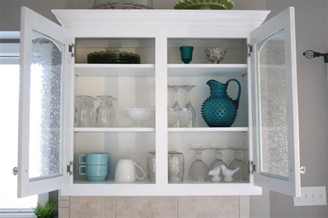 Then push it in and lock it down into the bracket. 12 Best Ideas of Glass Kitchen Shelves