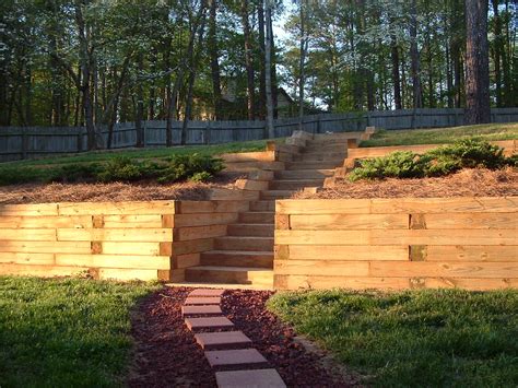 Granite slabs for retaining wall on project site. 2 tiered retaining wall with steps in Lilburn, ga | Justin ...