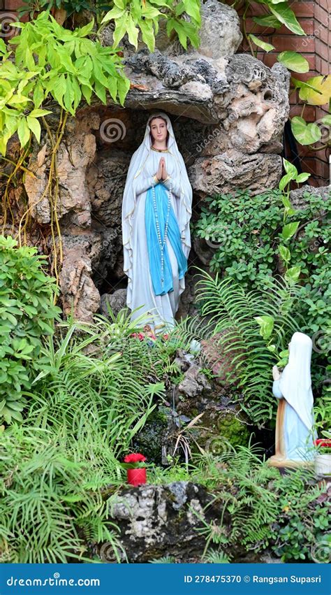 Statue Of Our Lady Of Grace Virgin Mary View With Natural Background In