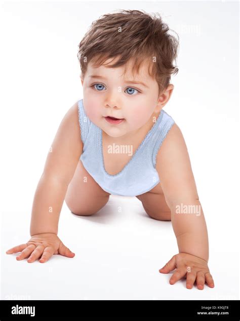 Cute Little Baby Boy Crawling In The Studio Isolated On White Grey