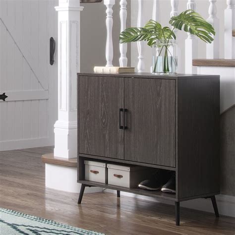 You can go the minimalist route and keep. Union Rustic Wysocki 12 Pair Shoe Storage Cabinet ...